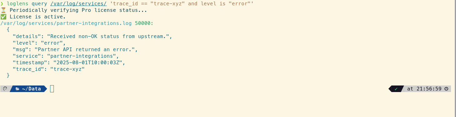 LogLens query command output showing a structured log entry from the partner-integrations service where level is error.